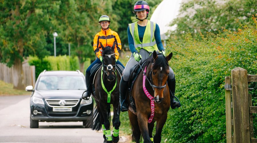 Horses And Riders In Hi Vis Hacking On The Road (2)