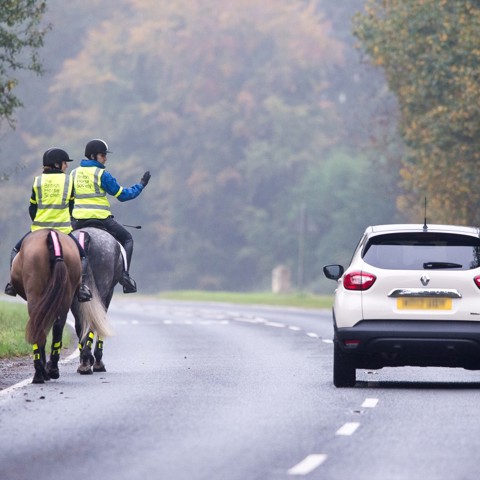 Access Car Passing Riders Slowly