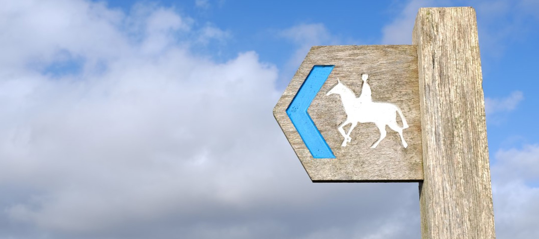 wooden bridleway sign